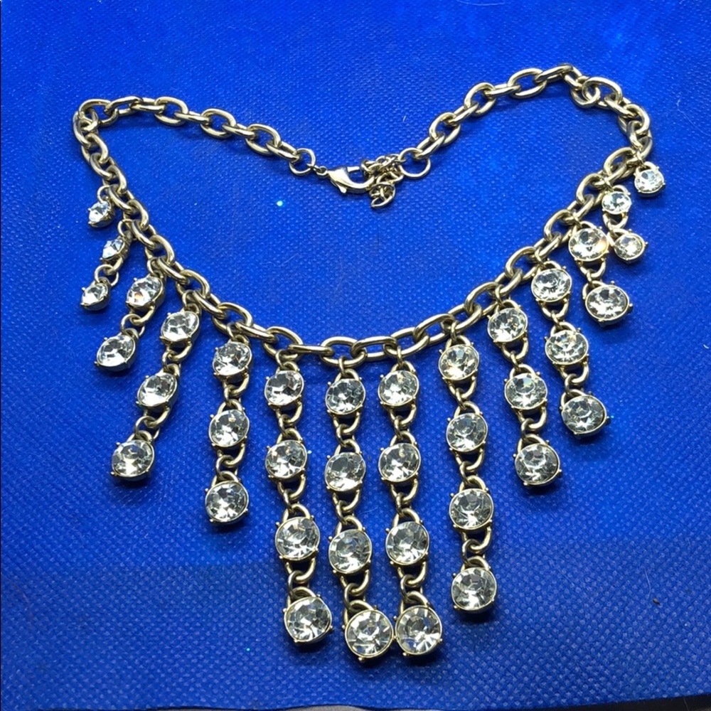 Gold color necklace / clear stones